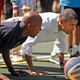 President Barack Obama (right) does pushups with retired NBA star Bruce Bowen during the annual Easter Egg Roll on the White House tennis court in Washington, D.C., on April 9, 2012.
Chip Somodevilla/Getty Images